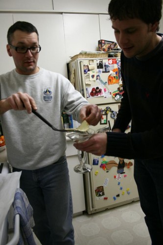 Now that is how it's done! Keith layers the cheese gently on top of the gin. We had to let the cheese harden slightly from the oven, but it was still flexible enough to coat the gin completely, floating on top like the melted cheese in, well, French Onion Soup!
